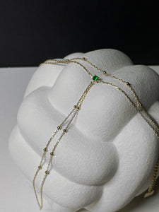 Handkette aus goldplattiertem Edelstahl mit Zirkonia